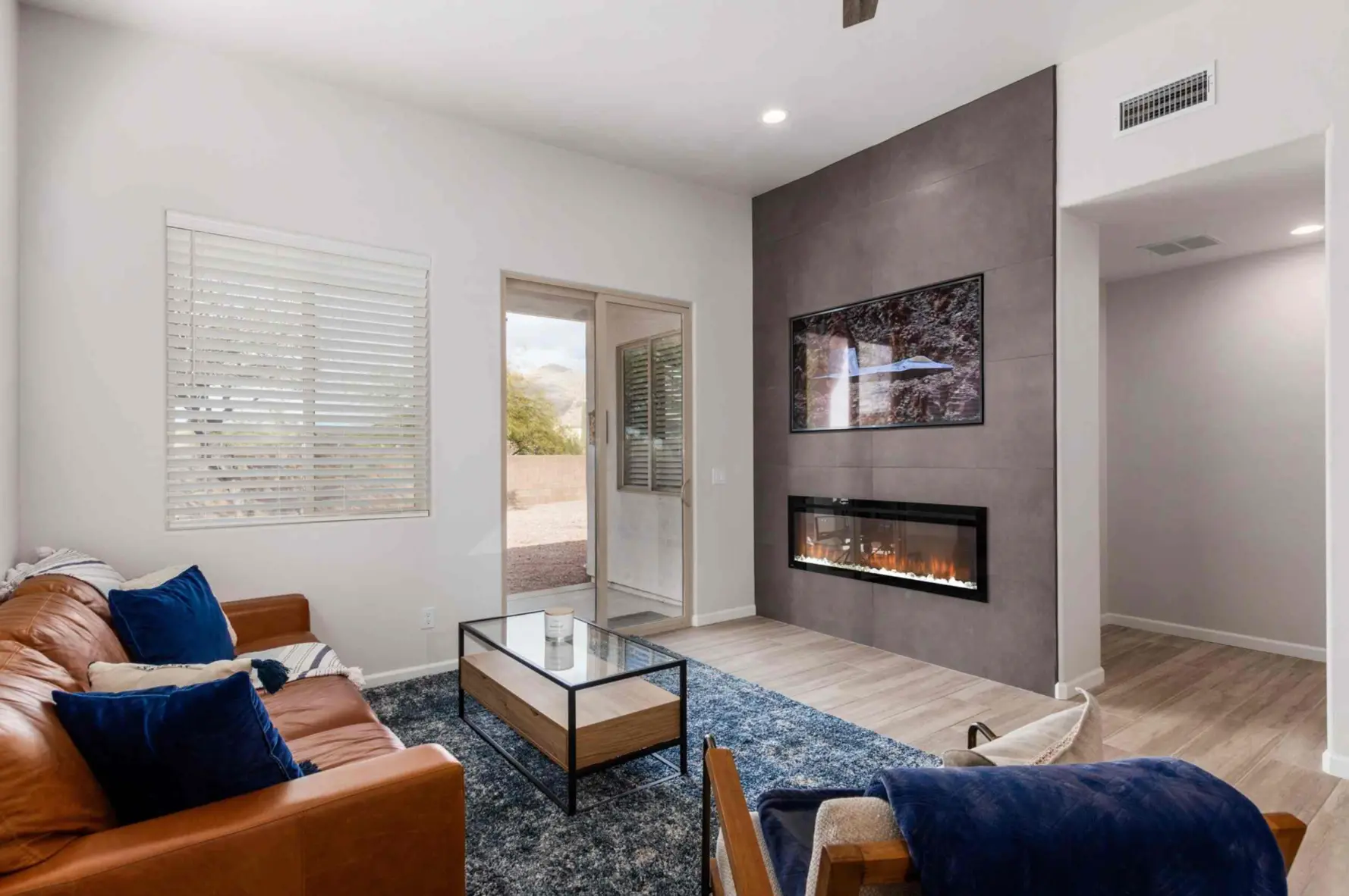 The Lomas — Living room with fireplace